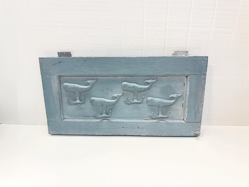 Whale coat rack made from a salvaged door